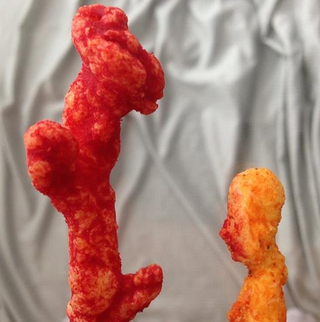 Illustration for article titled An Instagram user has been turning Cheetos into miniature art pieces